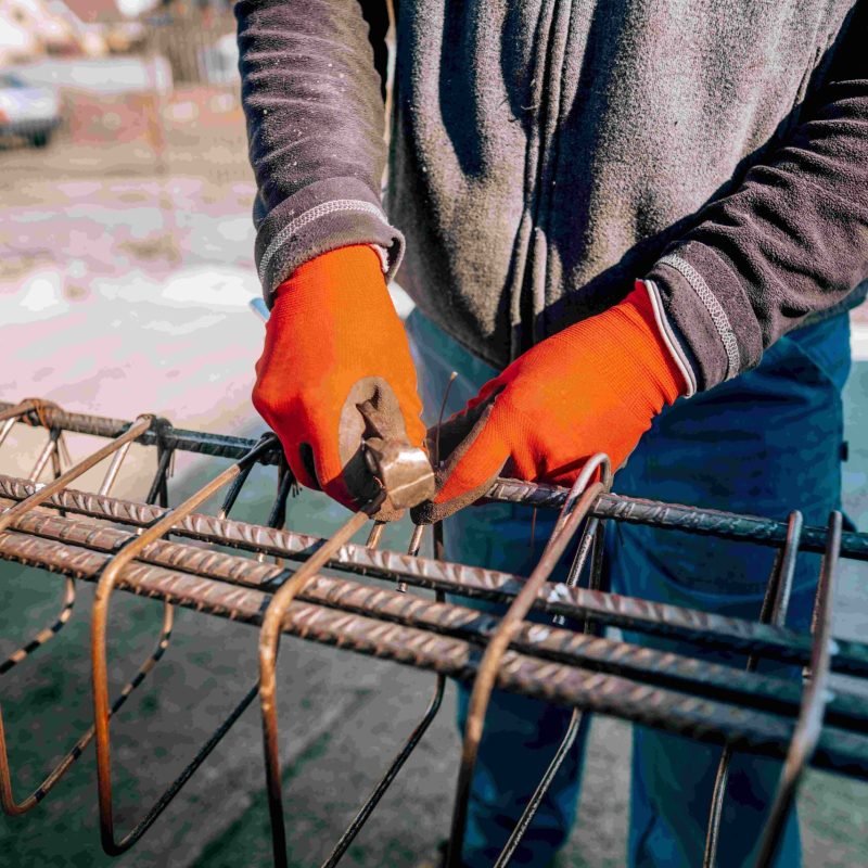 construction-worker-hands-securing-steel-bars-wi-2024-09-17-23-32-06-utc (1)